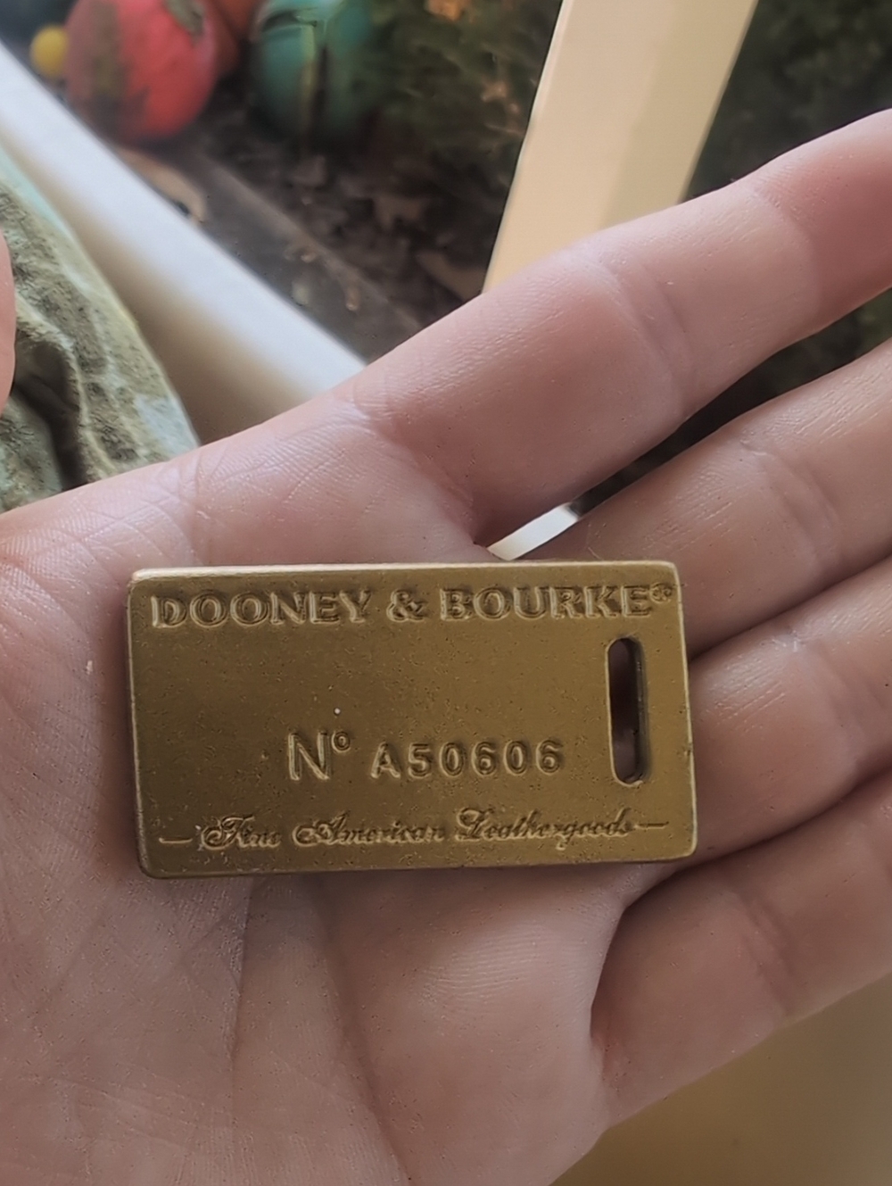 Dooney & Bourke Gold-Tone Brass Bag Tag
